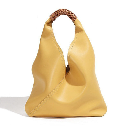 Yellow handbag with a woven handle on a white background
Material: leather

Size L30xH23xW10cm

Luggage trend style: Tote bag

Bag size: large

Popular element: knitting

Lining texture: polyester cotton

Bag shape: bucket type

Cover opening mode: magnetic buckle

Pattern: solid color

Processing method: soft surface

Hardness: soft